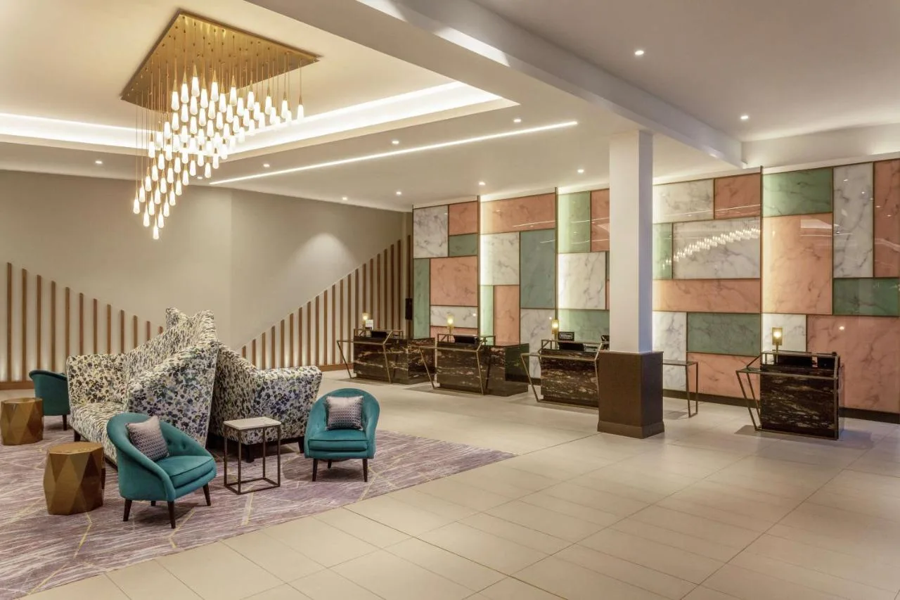 Hotel lobby with chandelier and seating at Hilton Aberdeen TECA